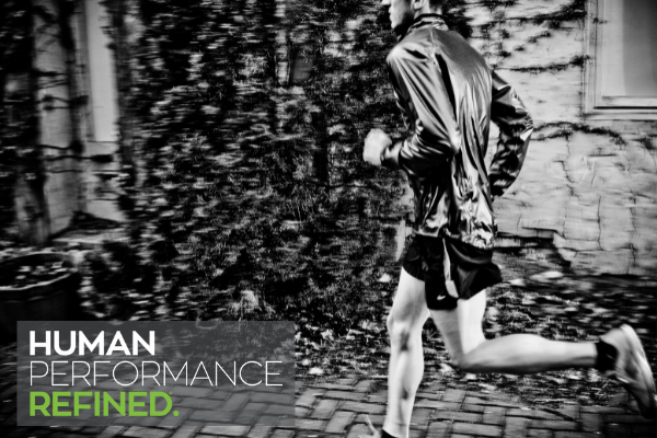 Black and white image of man running with
